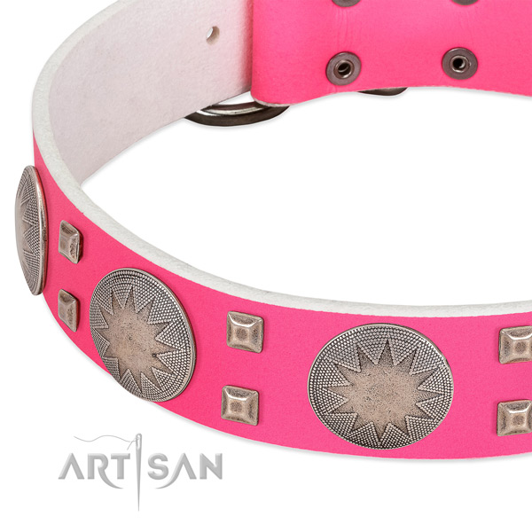 Pink leather dog collar with modern decorations